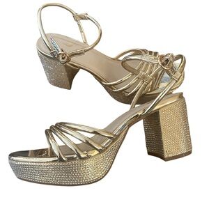 Gold, bedazzled chunky heels.